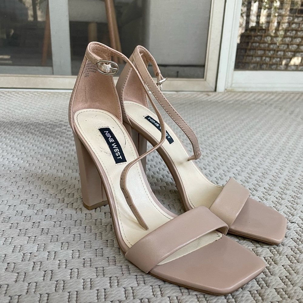 Nine West block heels with a slightly square toe.